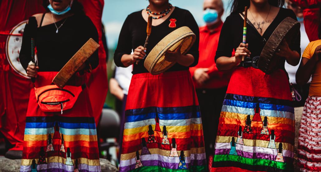 Photo of Women with ribbon skirts