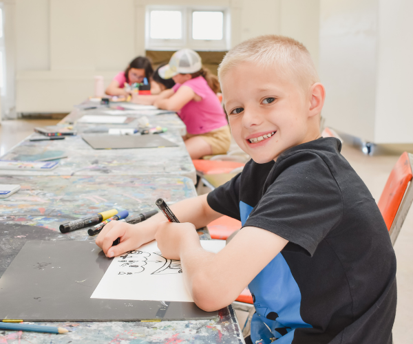 Child drawing in the Studio